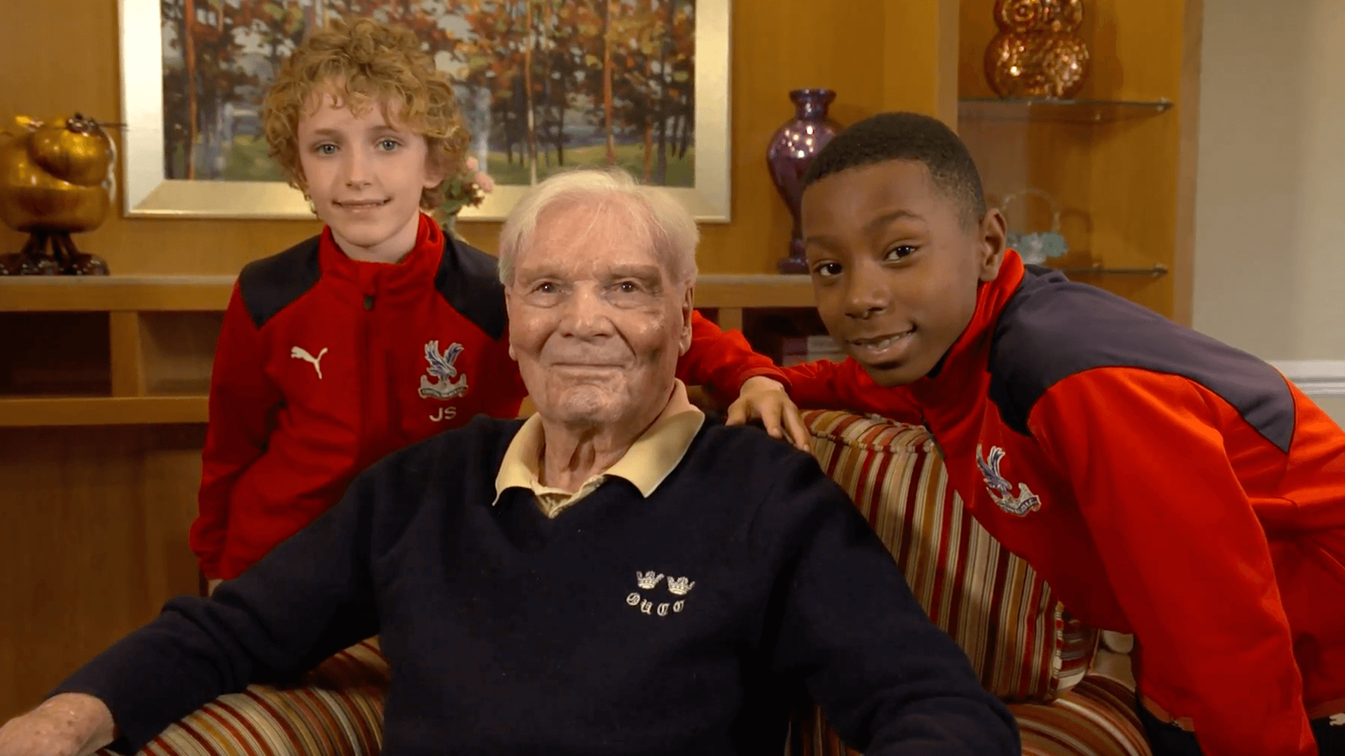 Young Premier League Academy players with a Football Remembers World War Two veteran